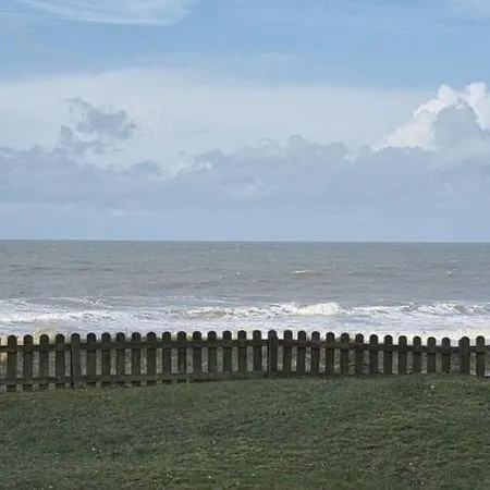 Strand-zeit - Ein Steinwurf Zum