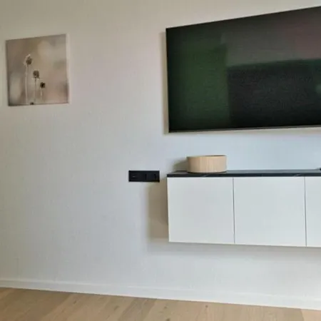 Strand-zeit - Ein Steinwurf Zum